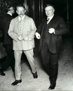 William Cameron, right, editor of the Dearborn Independent, leaves the federal courtroom in Detroit after testifying, March 1927